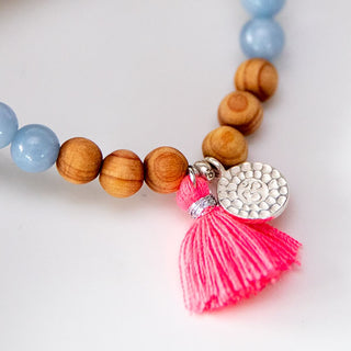 Mala Armband mit Sandelholzperlen und Om Anhänger aus Silber und Mini Quaste