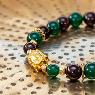Yoga Armband aus Granat mit goldenem Buddha Kopf